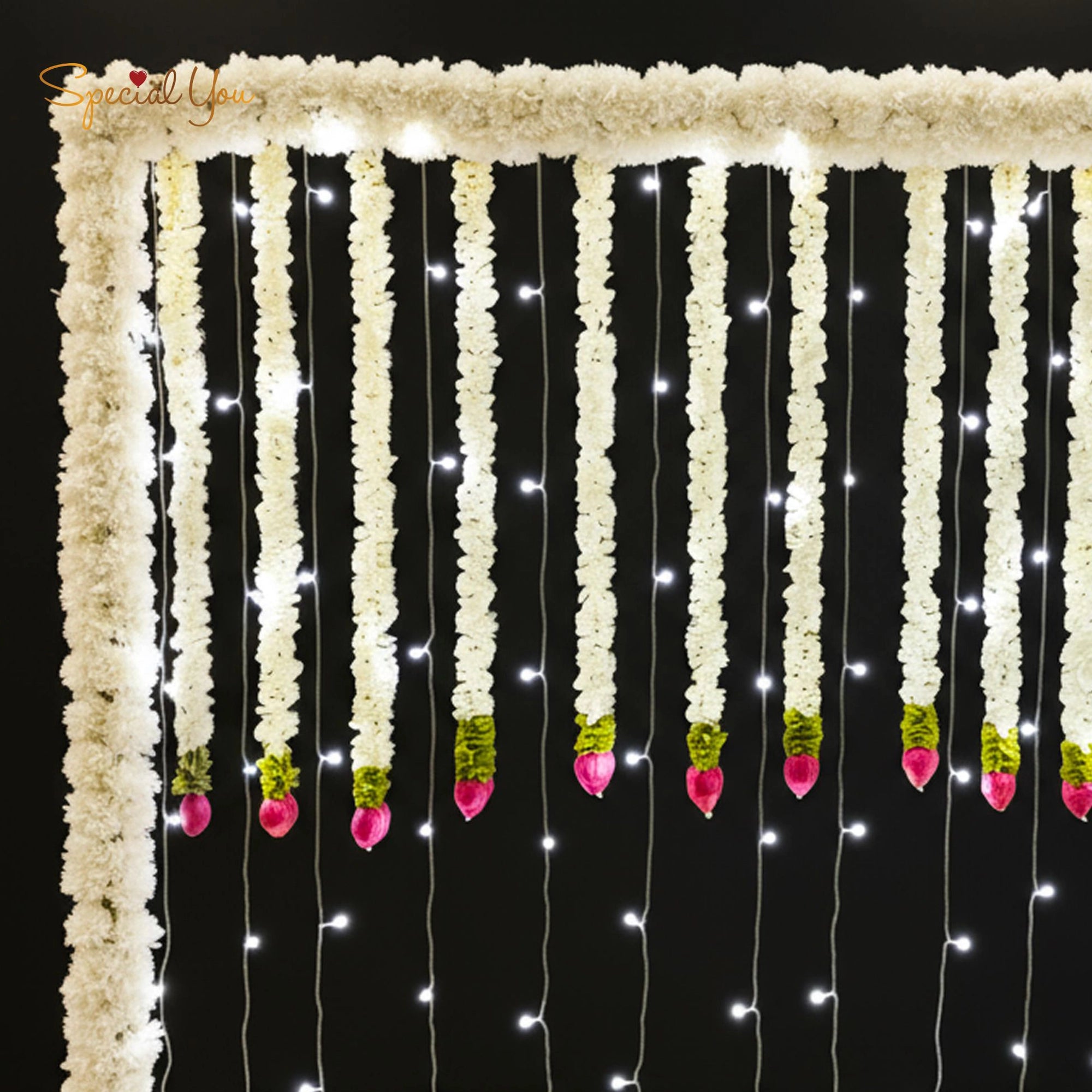 White Garland & Light Backdrop Decor