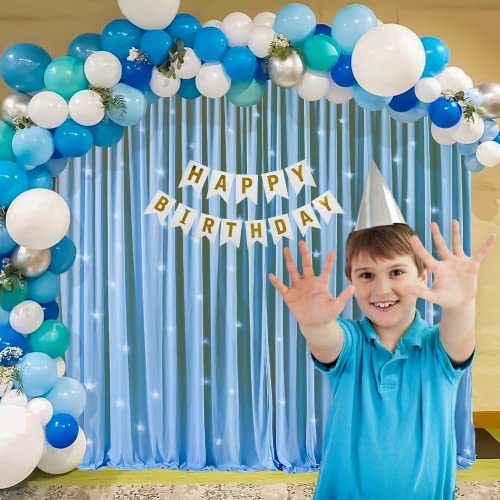 blue net curtain with blue balloons