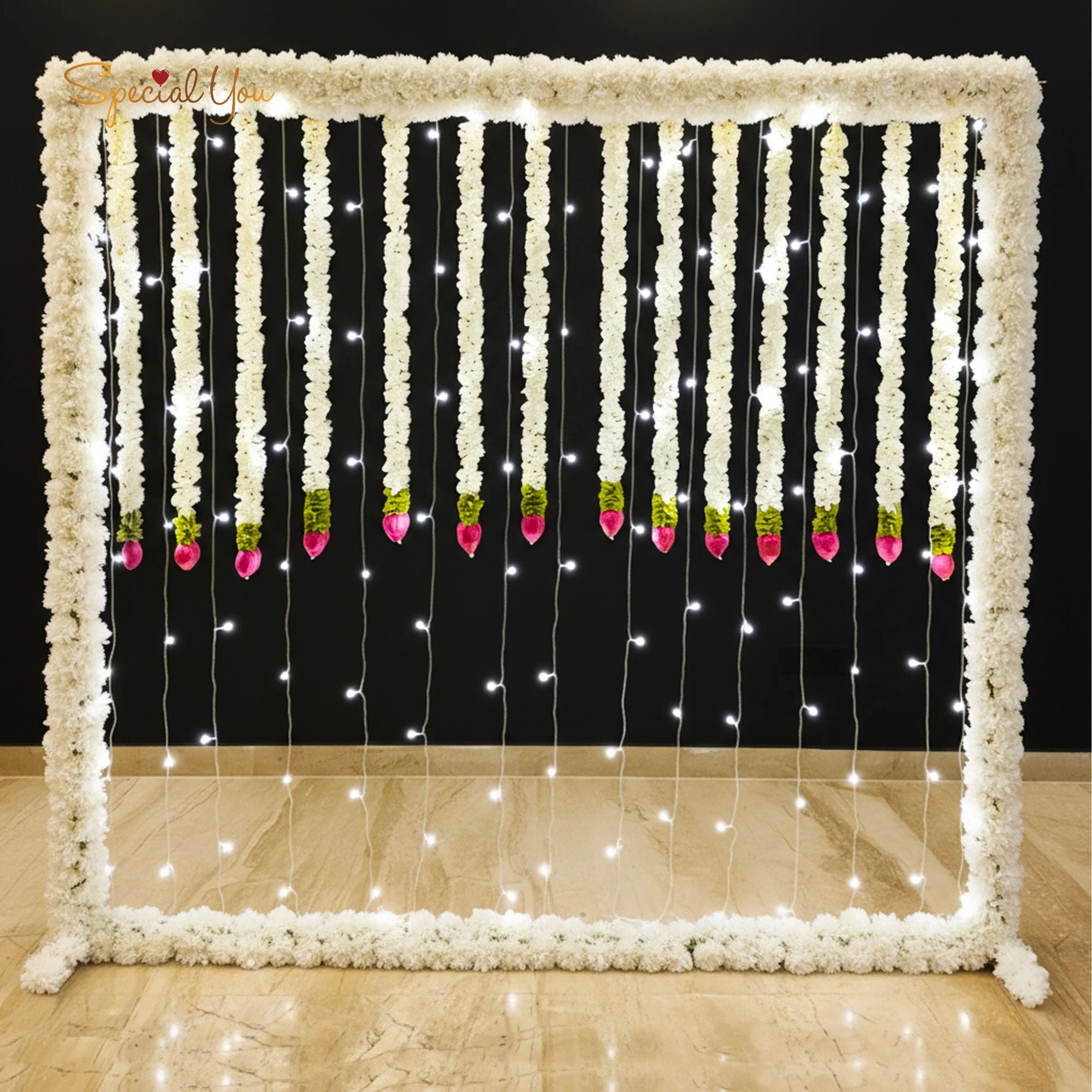 White Garland & Light Backdrop Decor