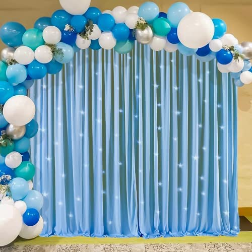 blue net curtain with blue balloons