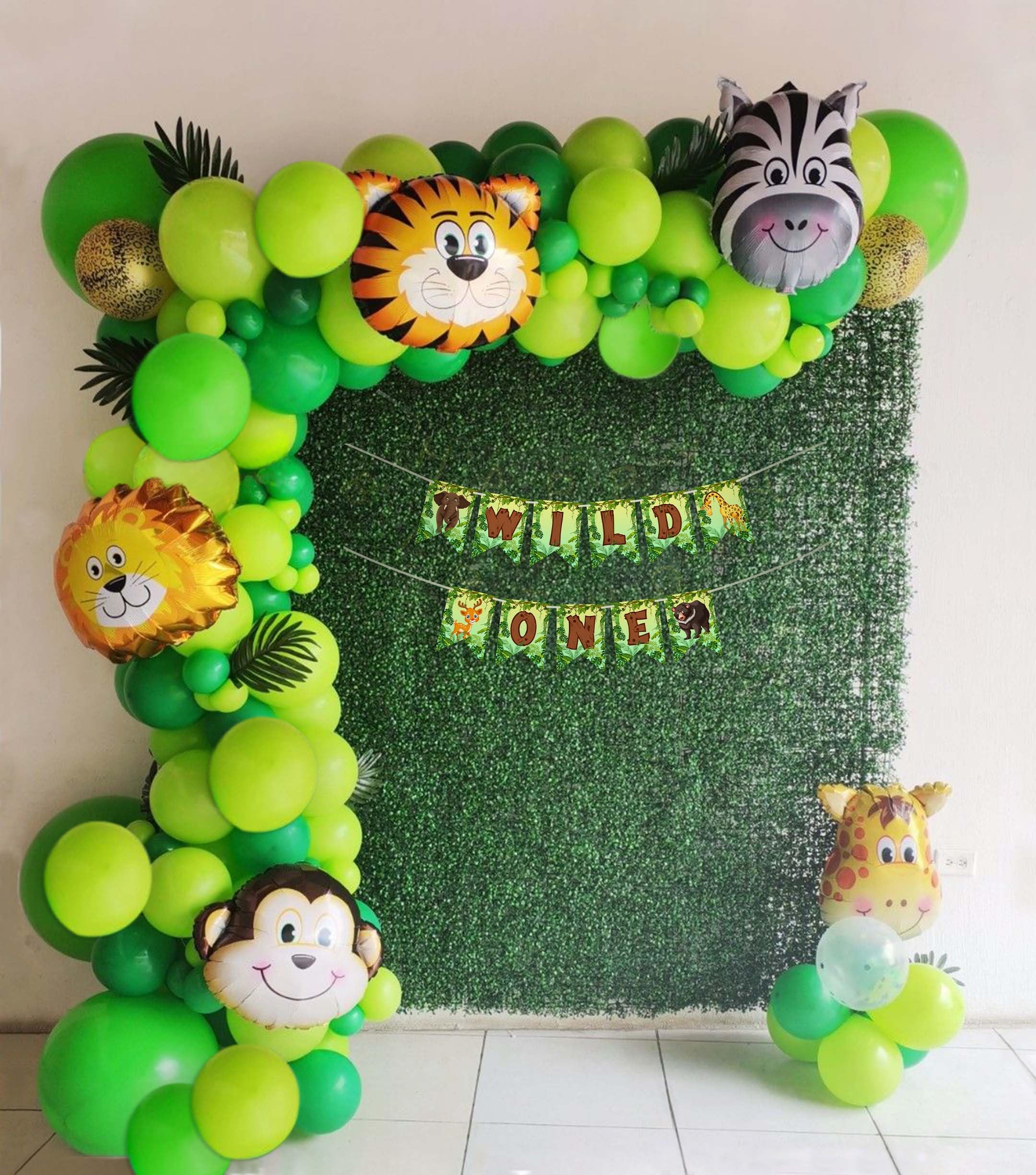 Jungle safari theme 1st birthday decoration with face foil balloon.