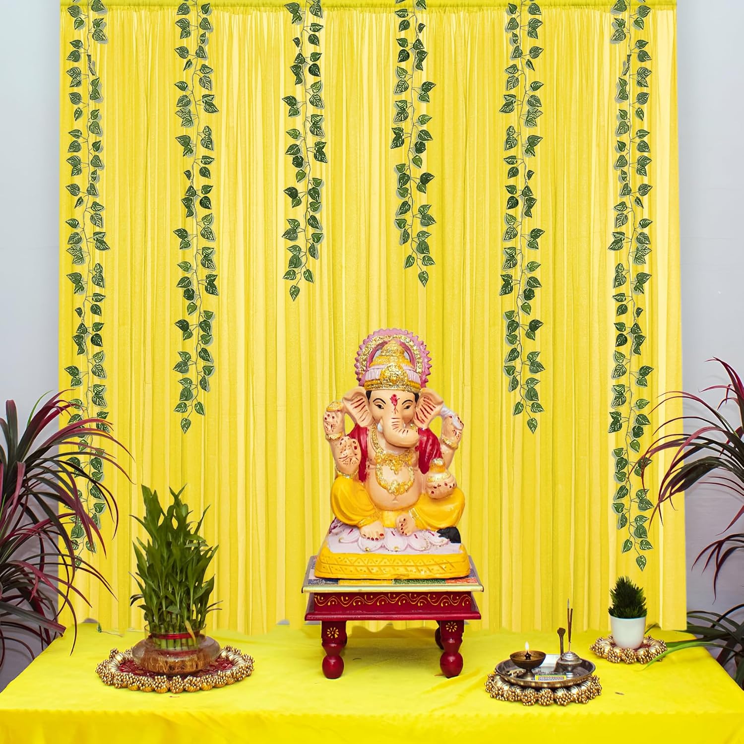 Yellow curtains with vines for festive decor